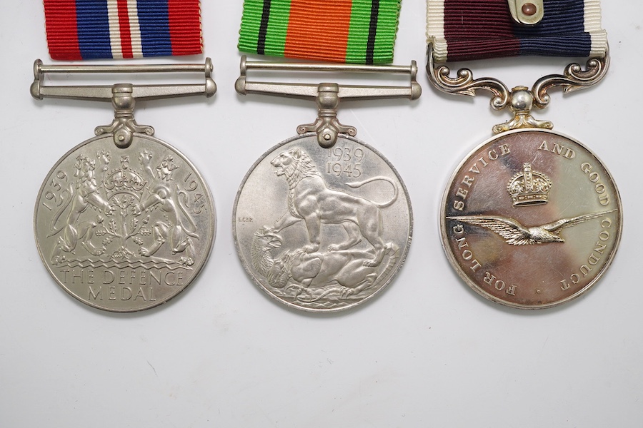 A group of assorted medals; WW2/ERII Cadet Forces medal group of 3 with two clasps to Fg.Off.W.K.Winstone R.A.F.V.R.(T); ERII RAFLSGC to Cpl B.K.Stockwell (F2570477) in box; WW2 Dm & WM. Condition - fair to good.